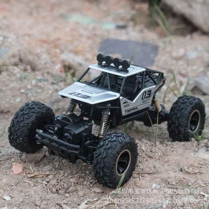 6141 Four Wheel Climbing Rock Crawler Monster Car 1:16 High Speed Remote Control Trunk Toy Combo with Spare 2000MAh/4.8V Rechargeable Battery and Charger